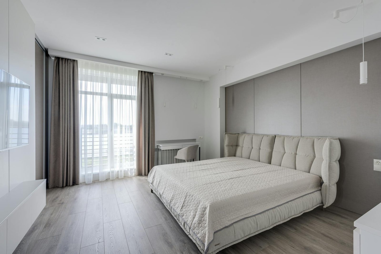 comfortable bedroom with light stylish interior