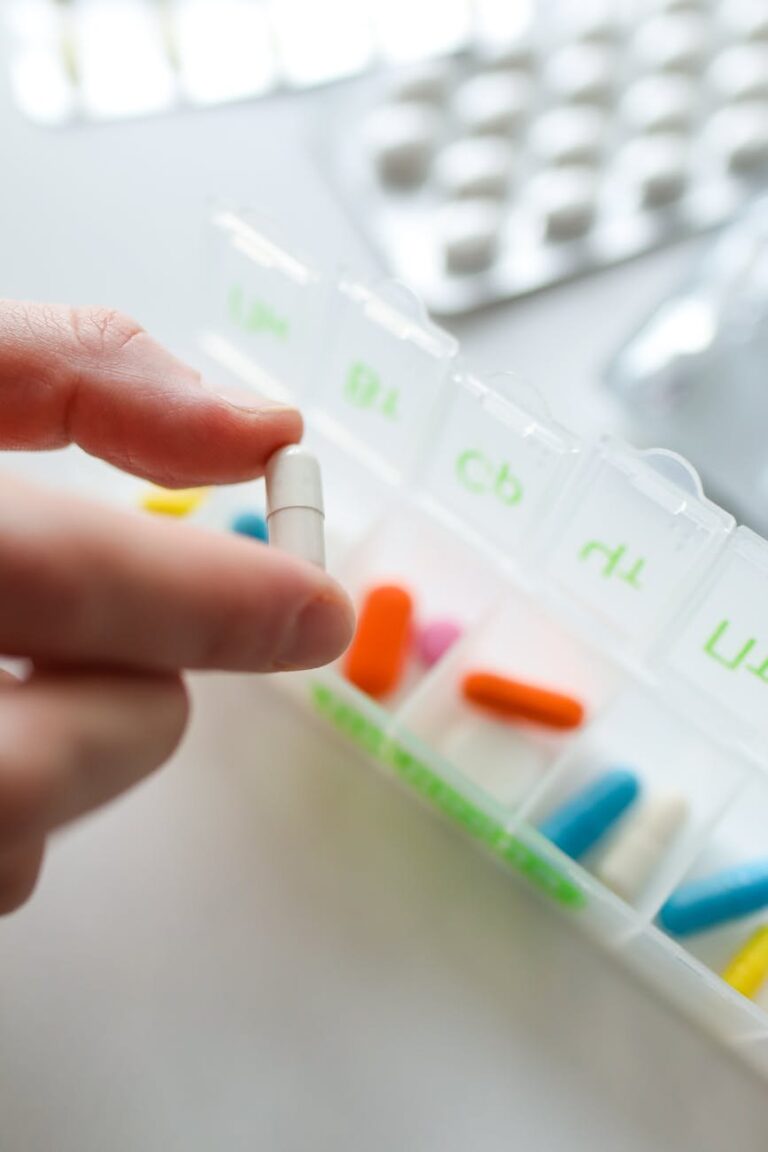 photo of person holding capsule