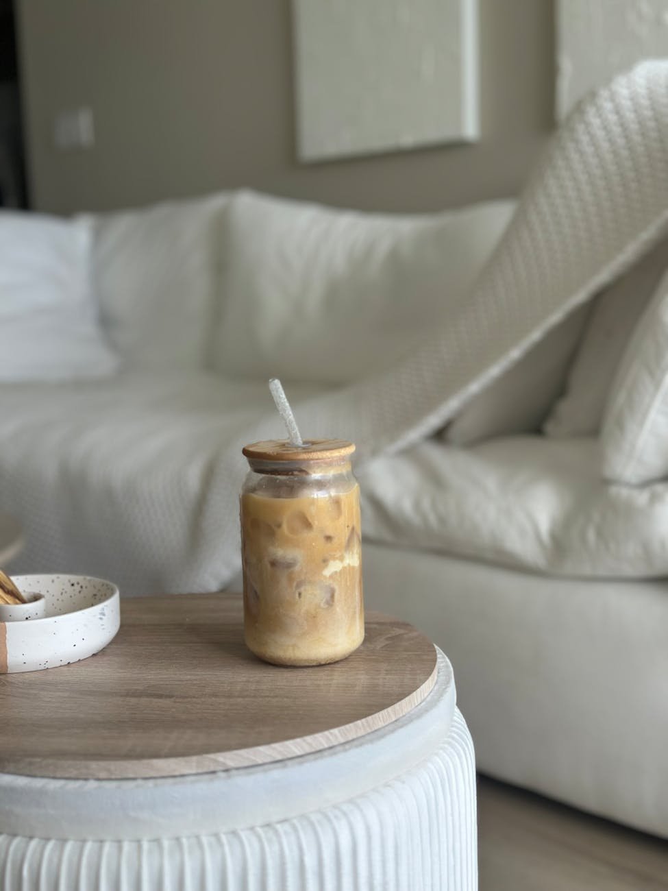 iced coffee in jar on modern coffee table